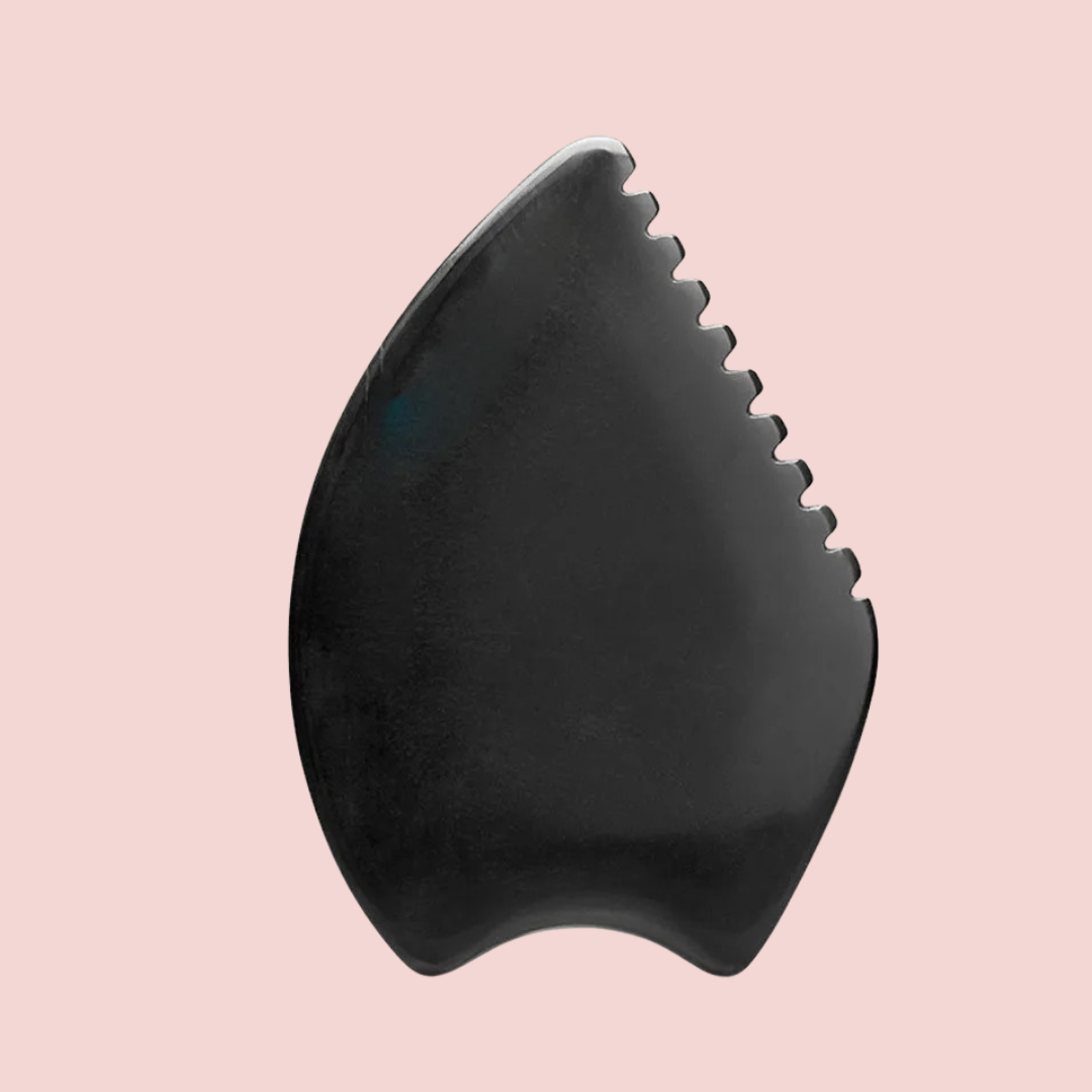 Sort gua sha-sten i bian-sten til massage af ansigt og hals